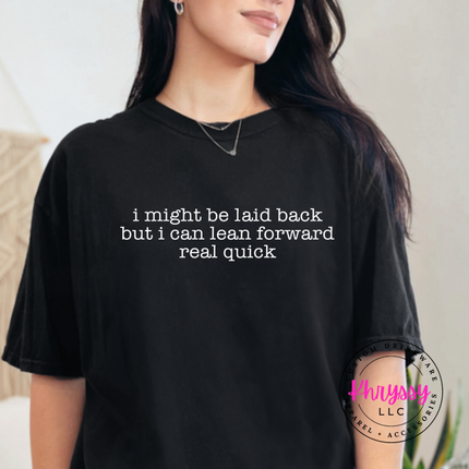 Black tee with white typewriter quote about being laid back but leaning forward.