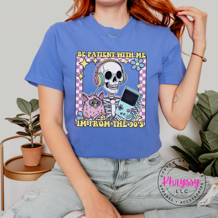 Close up of the retro skeleton art on a Fluorescent Blue tee.
