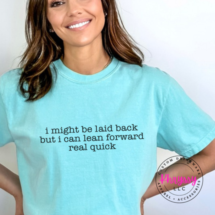 Chalky Mint tee with black typewriter quote about being laid back but leaning forward.