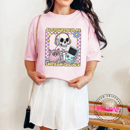 Close up of the retro skeleton art on a Blossom tee.