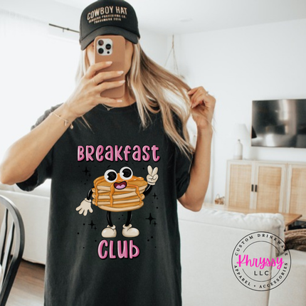 Close up of the pancake stack art on a Black tee.