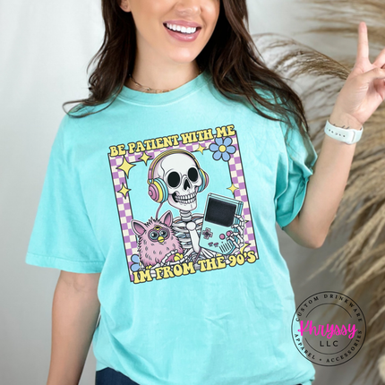 Close up of the retro skeleton art on a Chalky Mint tee.