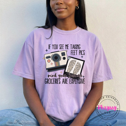 Orchid tee with a vintage Polaroid and groceries are expensive joke