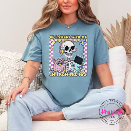Close up of the retro skeleton art on a Ice Blue tee.