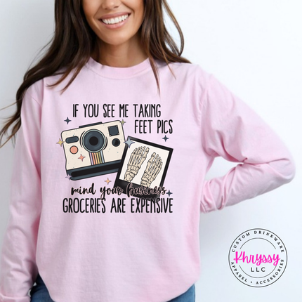 Blossom long sleeve tee with a retro camera and skeleton feet pics joke