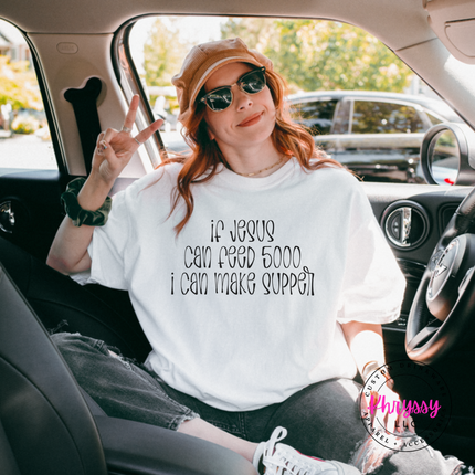 White tee with black If Jesus Can Feed 5000 I Can Make Supper print