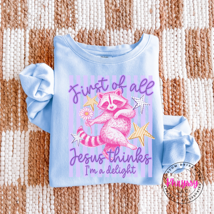 Hydrangea blue long sleeve tee showing a pink raccoon on lavender stripes