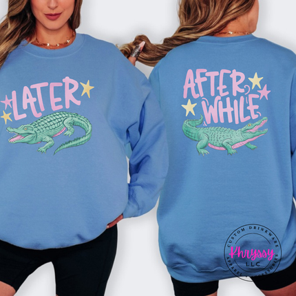 Carolina Blue crewneck sweatshirt with a retro pastel Later alligator print