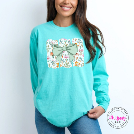 Chalky Mint long sleeve tee with a sage green bow over watercolor wildflower panels