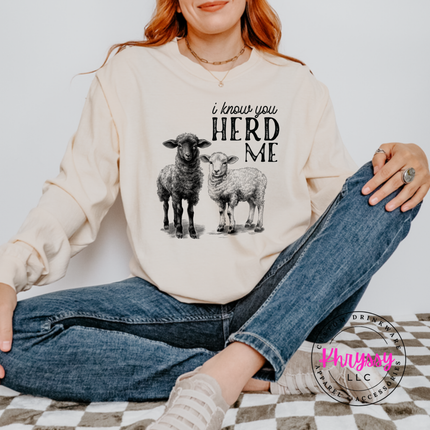 Ivory long sleeve tee with two sheep and the words i know you herd me