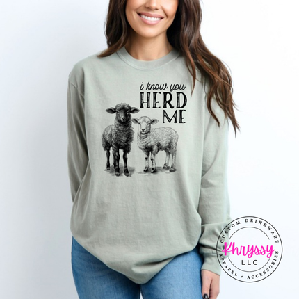 Sandstone long sleeve tee with two sheep and the words i know you herd me