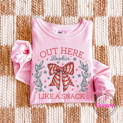 Blossom long sleeve tee with the Lookin Like A Snack candy cane bow.