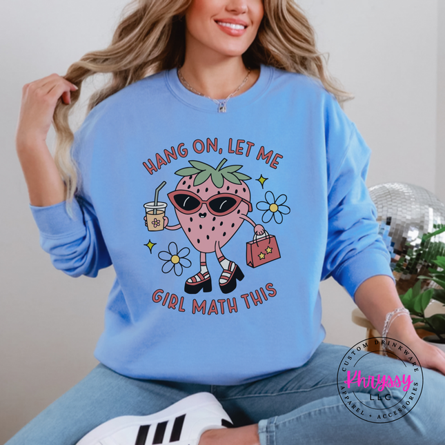 Carolina Blue crewneck sweatshirt with a pink strawberry in sunglasses and Girl Math slogan.