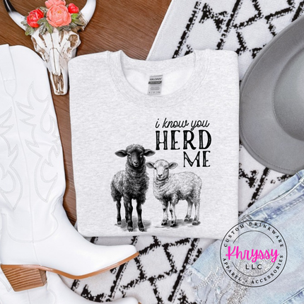 Ash crewneck sweatshirt with two sheep and the words i know you herd me