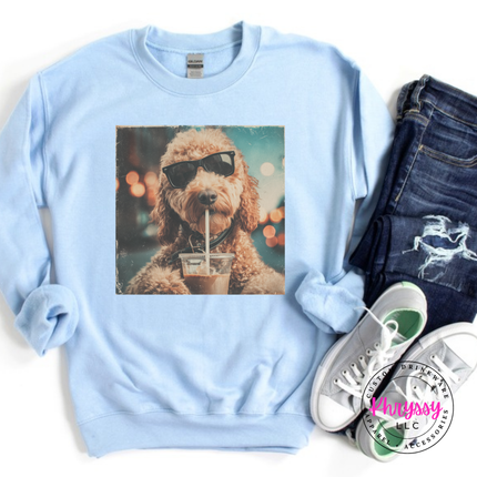Light Blue crewneck sweatshirt with a retro goldendoodle in sunglasses sipping iced coffee print.