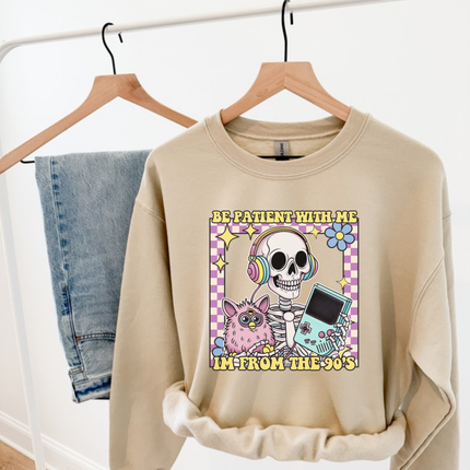 Close up of the retro skeleton art on a Sand crewneck sweatshirt.