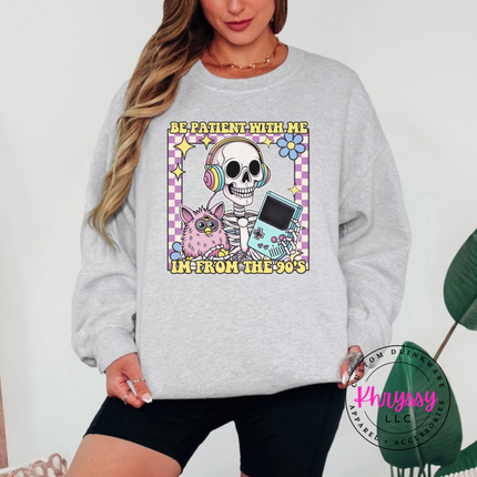 Close up of the retro skeleton art on a Ash crewneck sweatshirt.