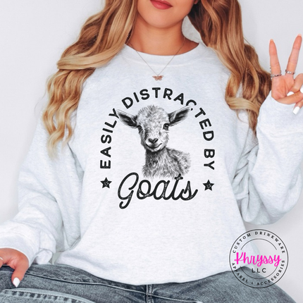 Ash crewneck sweatshirt with Easily Distracted by Goats print and sketched baby goat.