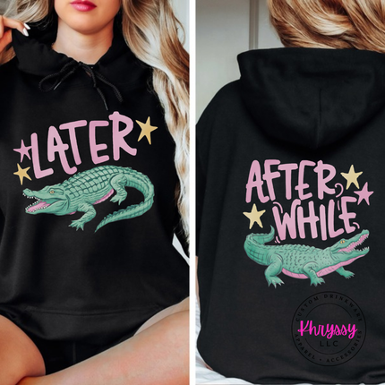 Black hoodie with a retro pastel Later alligator print on the front