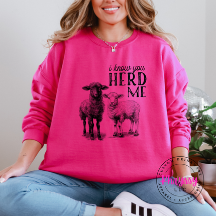 Heliconia crewneck sweatshirt with two sheep and the words i know you herd me