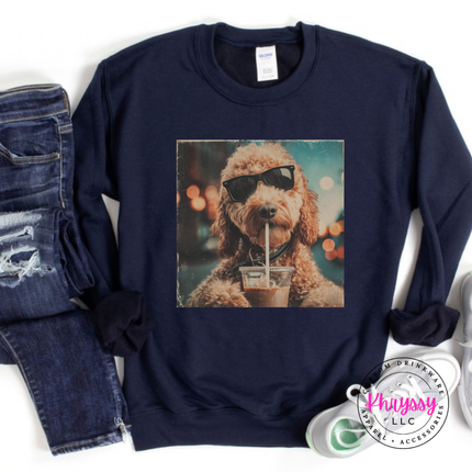 Navy crewneck sweatshirt with a retro goldendoodle in sunglasses sipping iced coffee print.