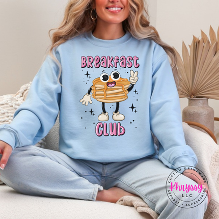 Flat lay of the Breakfast Club Pancake pancake stack crewneck sweatshirt in Light Blue.