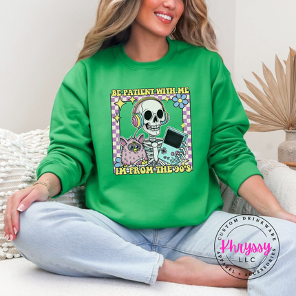 Close up of the retro skeleton art on a Irish Green crewneck sweatshirt.