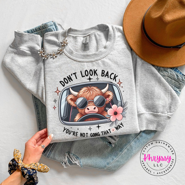Ash crewneck sweatshirt with a highland cow in sunglasses and Don't Look Back print
