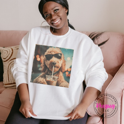 White crewneck sweatshirt with a retro goldendoodle in sunglasses sipping iced coffee print.