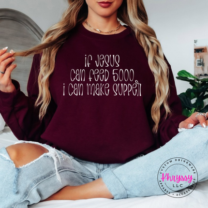 Maroon crewneck sweatshirt with white If Jesus Can Feed 5000 I Can Make Supper print