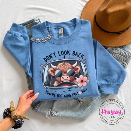 Carolina Blue crewneck sweatshirt with a highland cow in sunglasses and Don't Look Back print