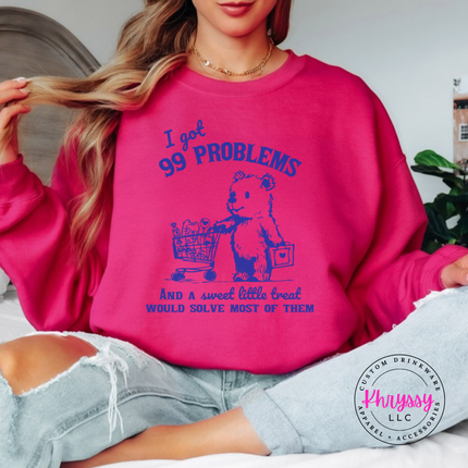 Close up of the treat bear art on a Heliconia crewneck sweatshirt.
