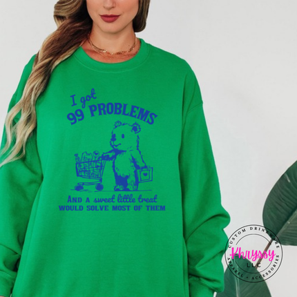 Close up of the treat bear art on a Irish Green crewneck sweatshirt.