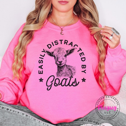 Safety Pink crewneck sweatshirt with Easily Distracted by Goats print and sketched baby goat.