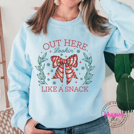 Light Blue crewneck sweatshirt with the Lookin Like A Snack candy cane bow.