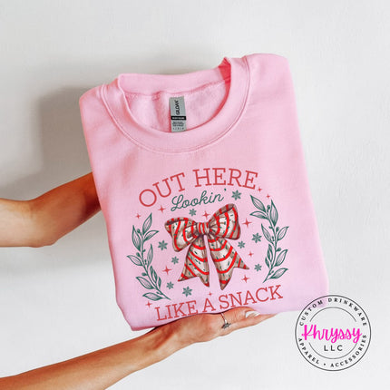 Light Pink crewneck sweatshirt with the Lookin Like A Snack candy cane bow.