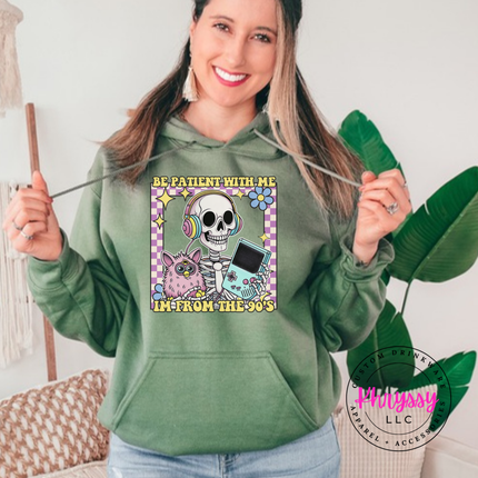 Close up of the retro skeleton art on a Military Green hoodie.