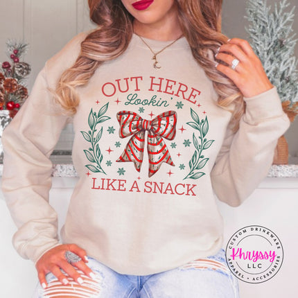 Sand crewneck sweatshirt with the Lookin Like A Snack candy cane bow.