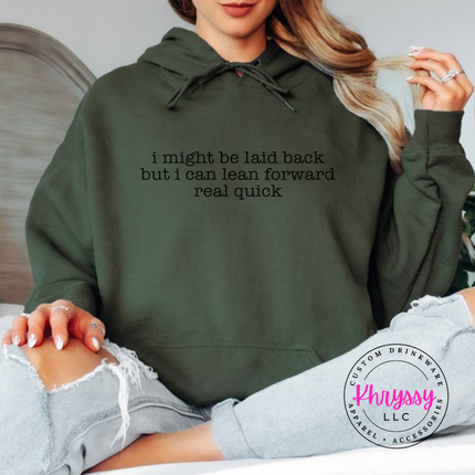 Military Green hoodie with black typewriter quote about being laid back but leaning forward.