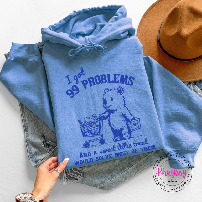 Close up of the treat bear art on a Carolina Blue hoodie.