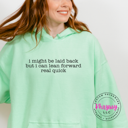 Mint Green hoodie with black typewriter quote about being laid back but leaning forward.