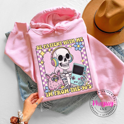 Close up of the retro skeleton art on a Light Pink hoodie.