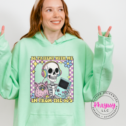 Close up of the retro skeleton art on a Mint Green hoodie.