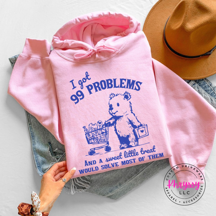 Close up of the treat bear art on a Light Pink hoodie.