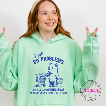 Close up of the treat bear art on a Mint Green hoodie.