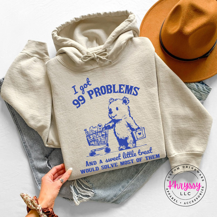 Close up of the treat bear art on a Sand hoodie.