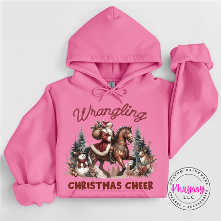 Wrangling Christmas Cheer hoodie in Azalea featuring Santa on horseback.