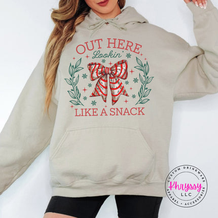 Sand hoodie with the Lookin Like A Snack candy cane bow.
