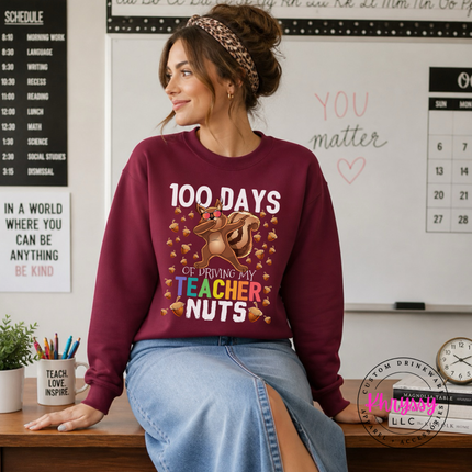 Close-up of the squirrel and rainbow teacher text in Garnet.