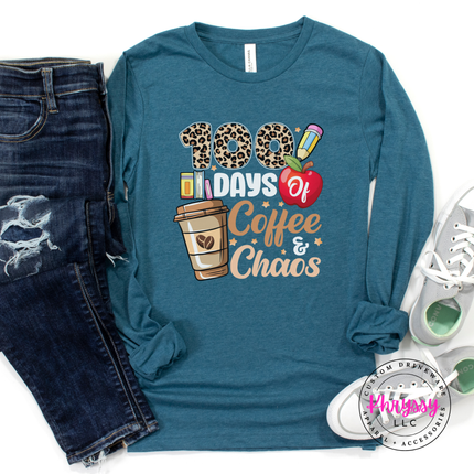 Close-up of the coffee cup and apple icon on an heather deep teal colored tee.